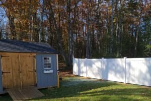 Vinyl privacy fence installation