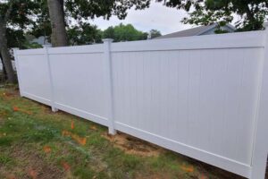 Vinyl privacy fence installation