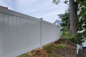 Vinyl privacy fence installation